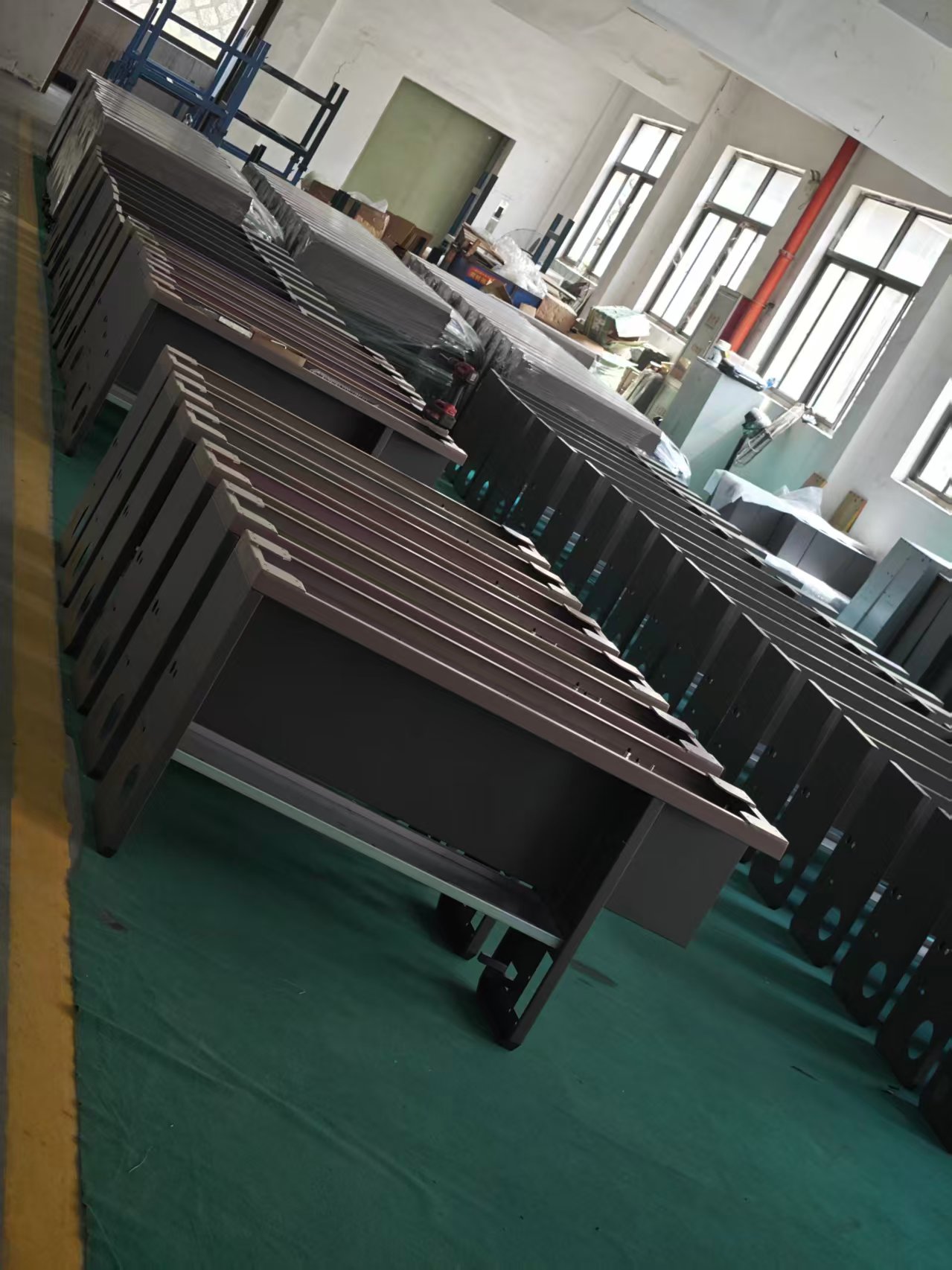Rows of cabinet frames in production